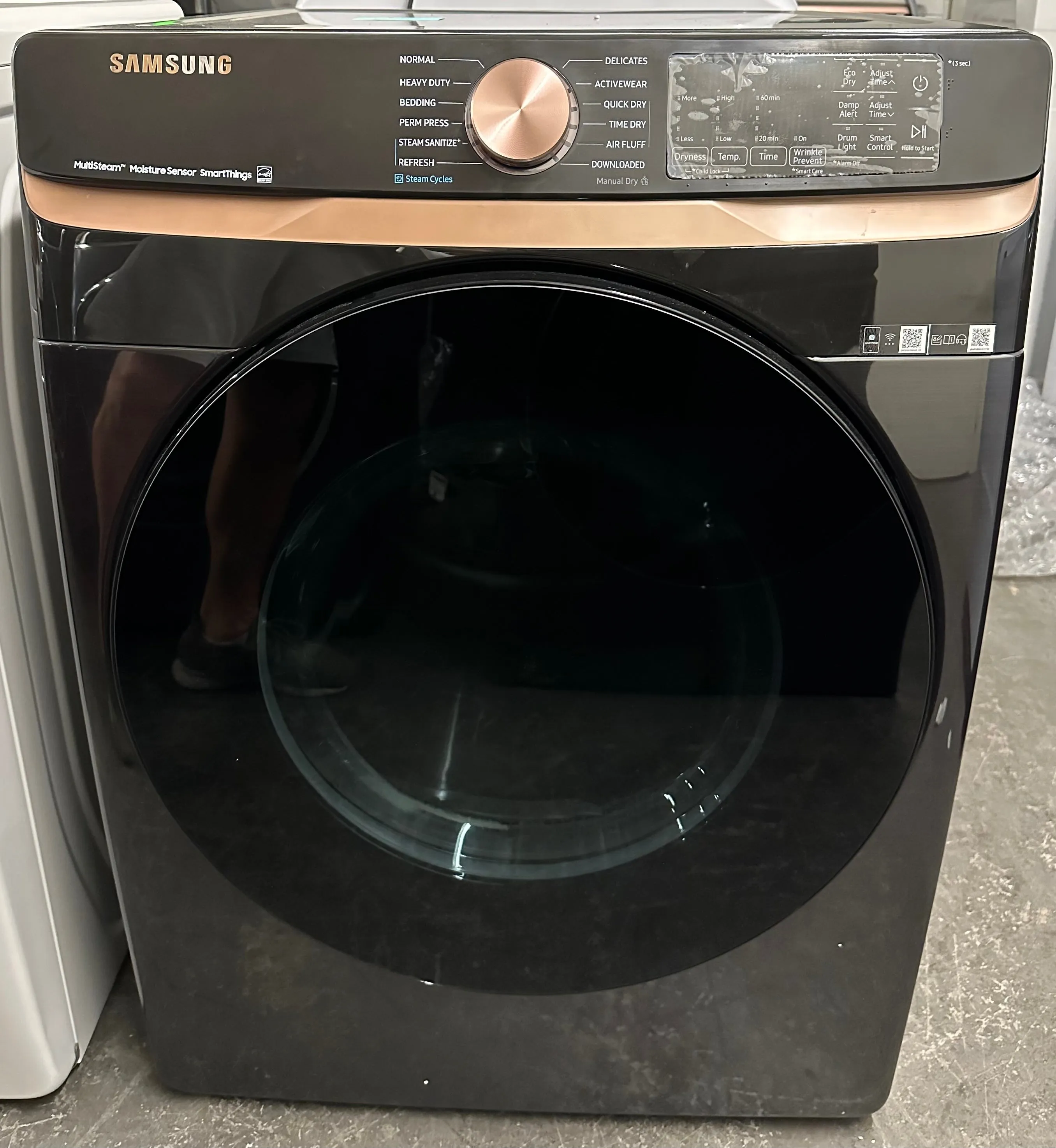 Samsung DVE50BG8300V 27 Inch Electric Dryer with 7.5 cu. ft. Capacity, Steam Sanitize , Sensor Dry, Vent Sensor, Smart Care, Wi-Fi, 21 Drying Cycles, Quick Dry, Wrinkle Prevent, ADA Compliant, and ENERGY STAR® Certified: Brushed Black